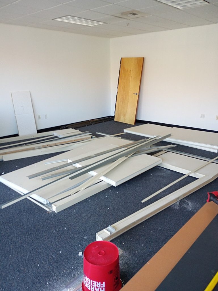 Office cubicle tear-out and commercial junk removal in progress in Reno, NV