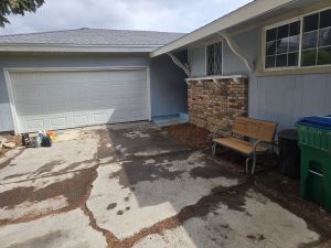 Furniture and household junk hauling job in Reno, NV — wide view
